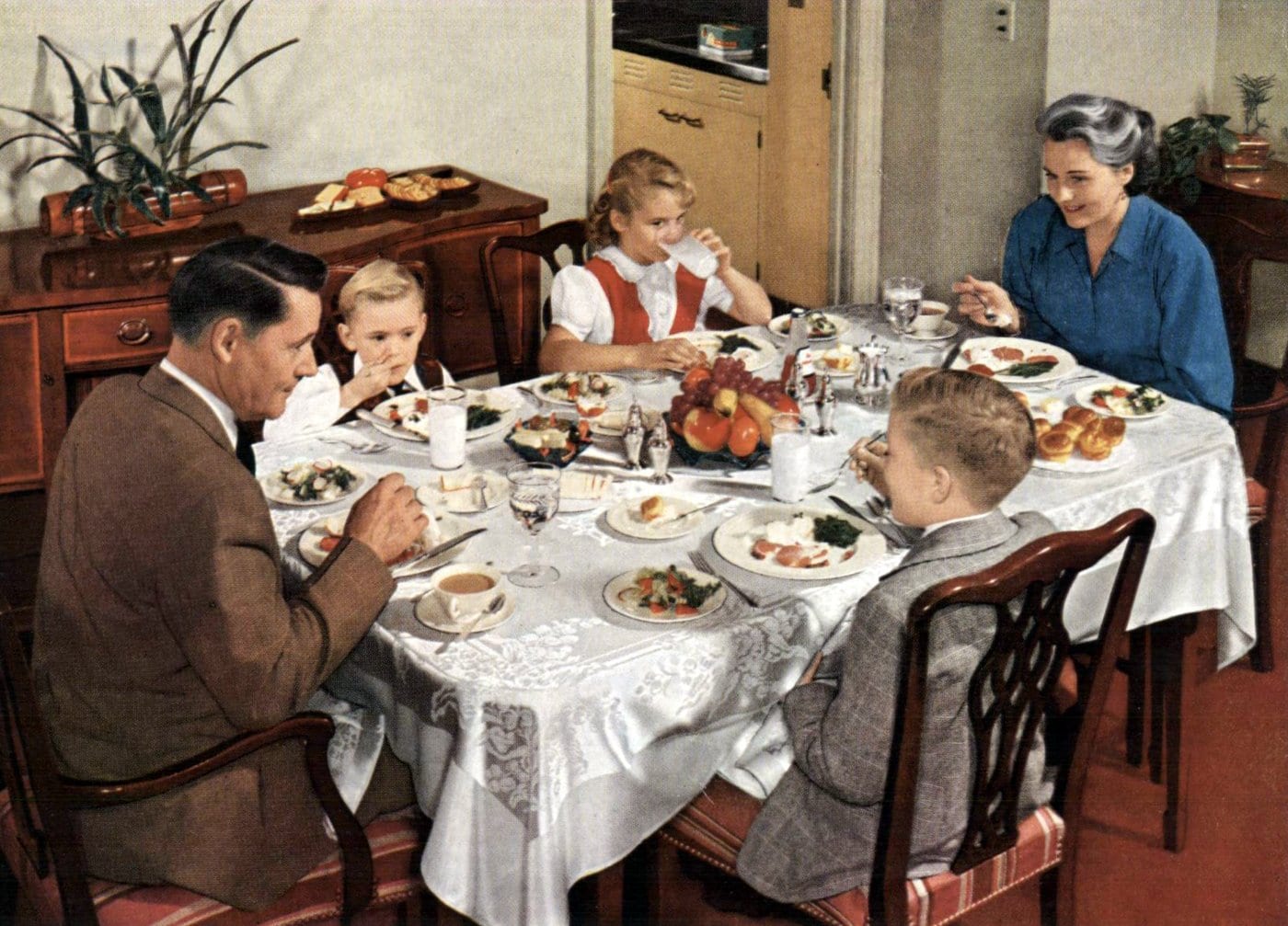 1950 family around the dinner table