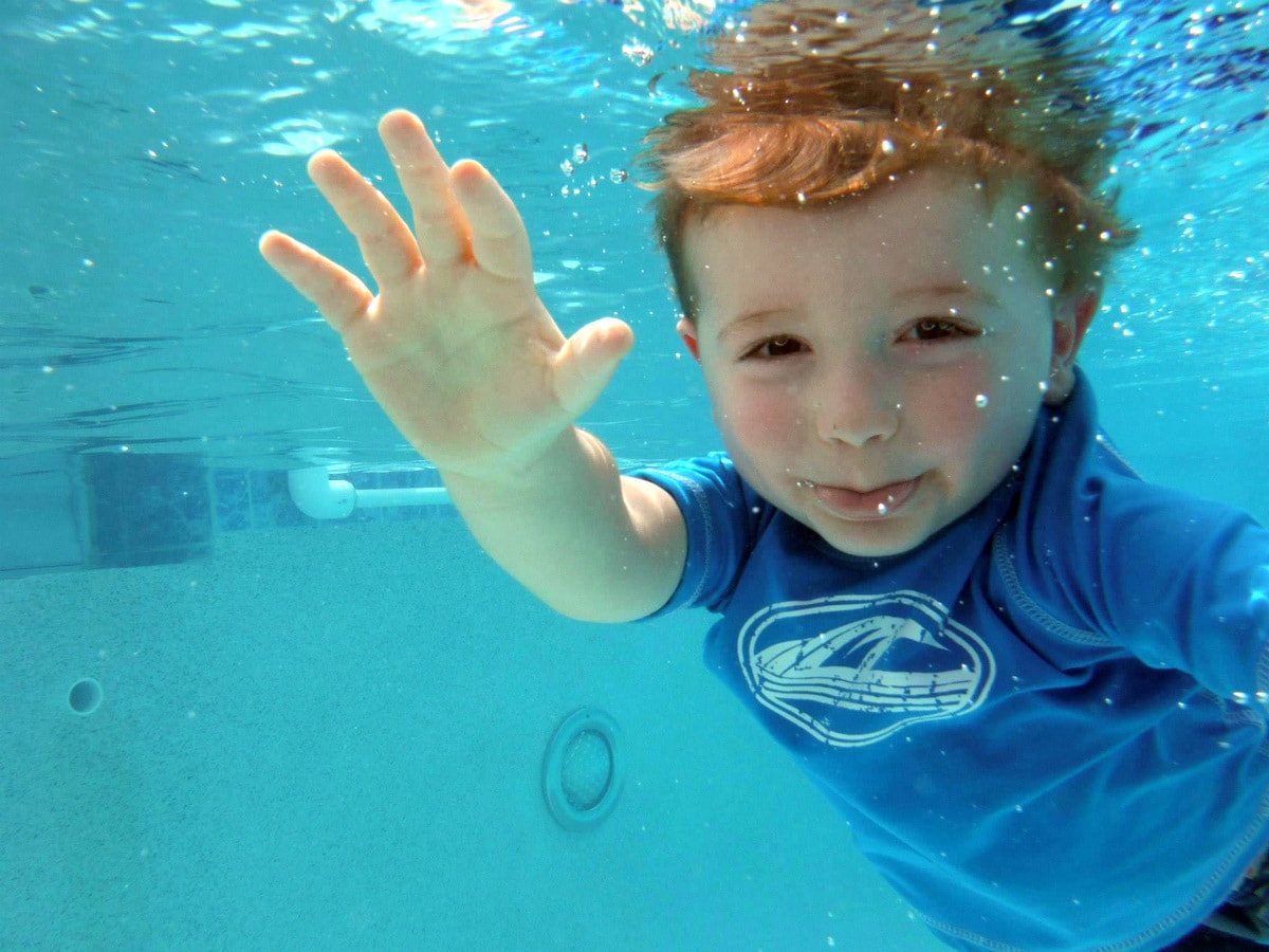 2 years old boy underwater having swimming lessons