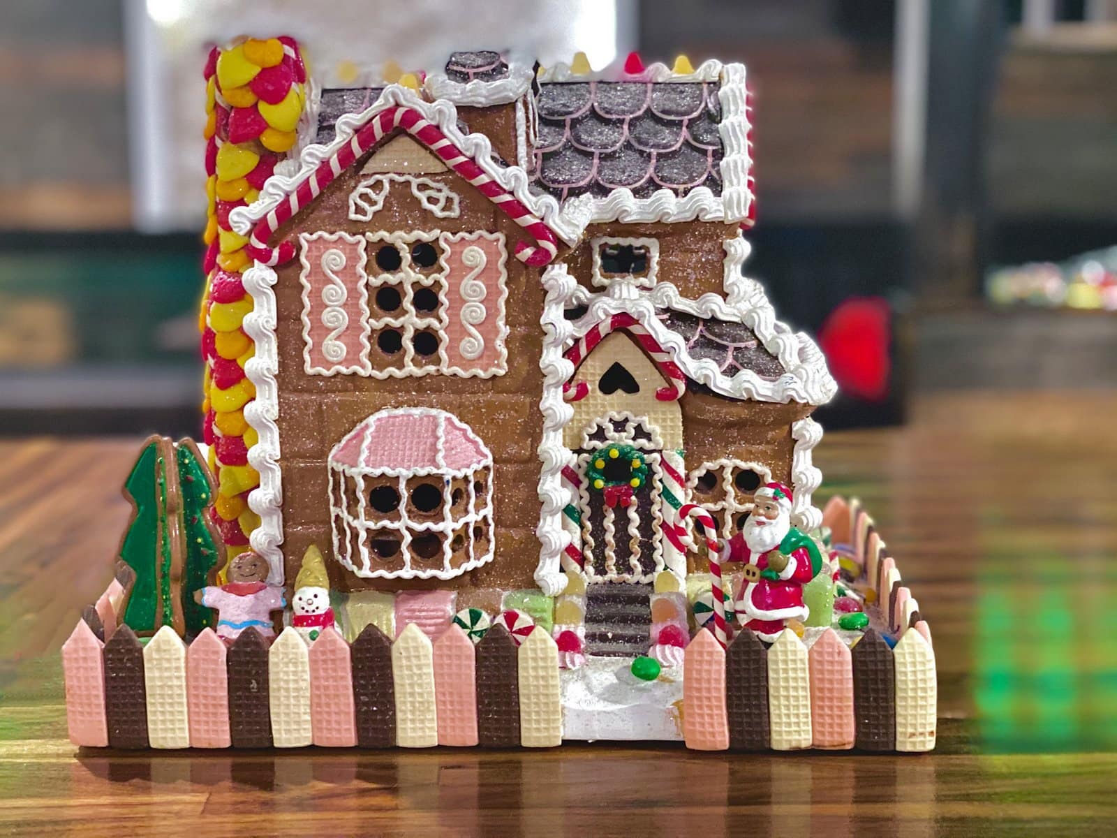 Beautiful detailed gingerbread house with cookies and candy