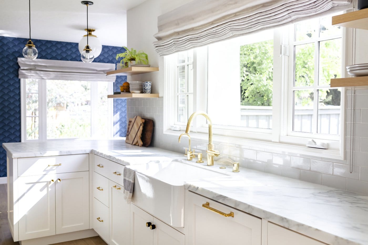 Beautiful white kitchen with golden accents