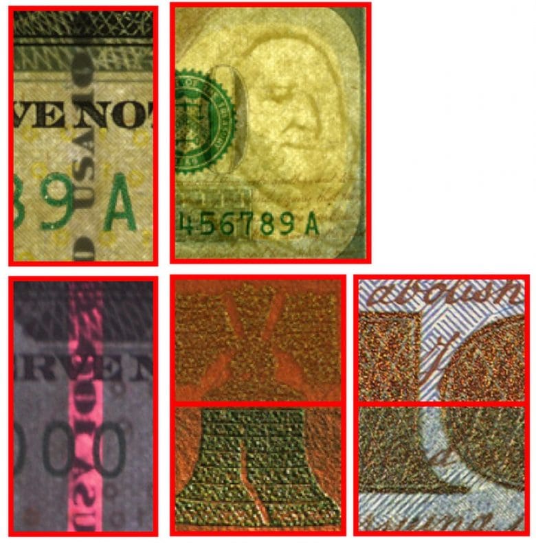 Close-up security features on real US 100 dollar bill