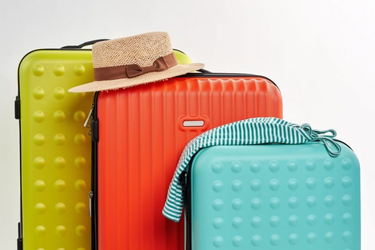 Colorful suitcases to check when flying on a plane