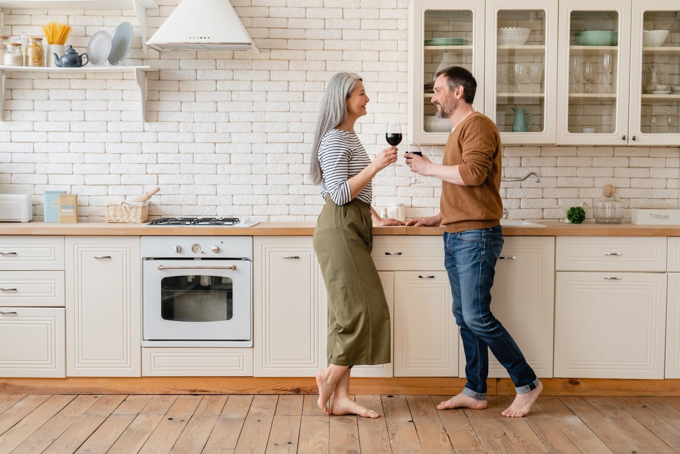Couple in their new home's kitchen