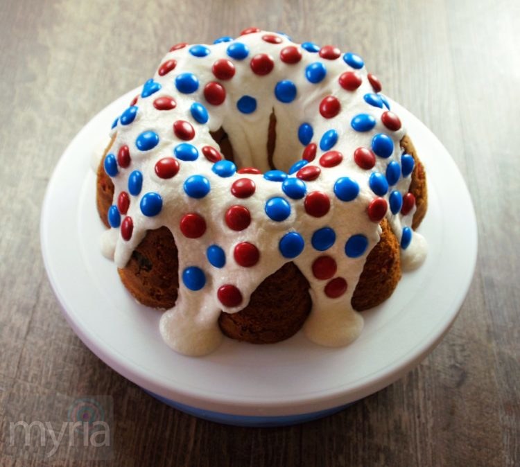 Iced red white and blue polka dot cake with mms candies