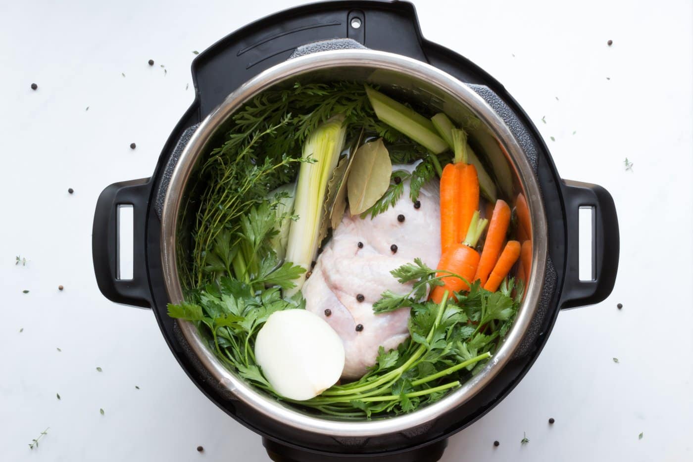 Instant pot electronic slow cooker with chicken and vegetables