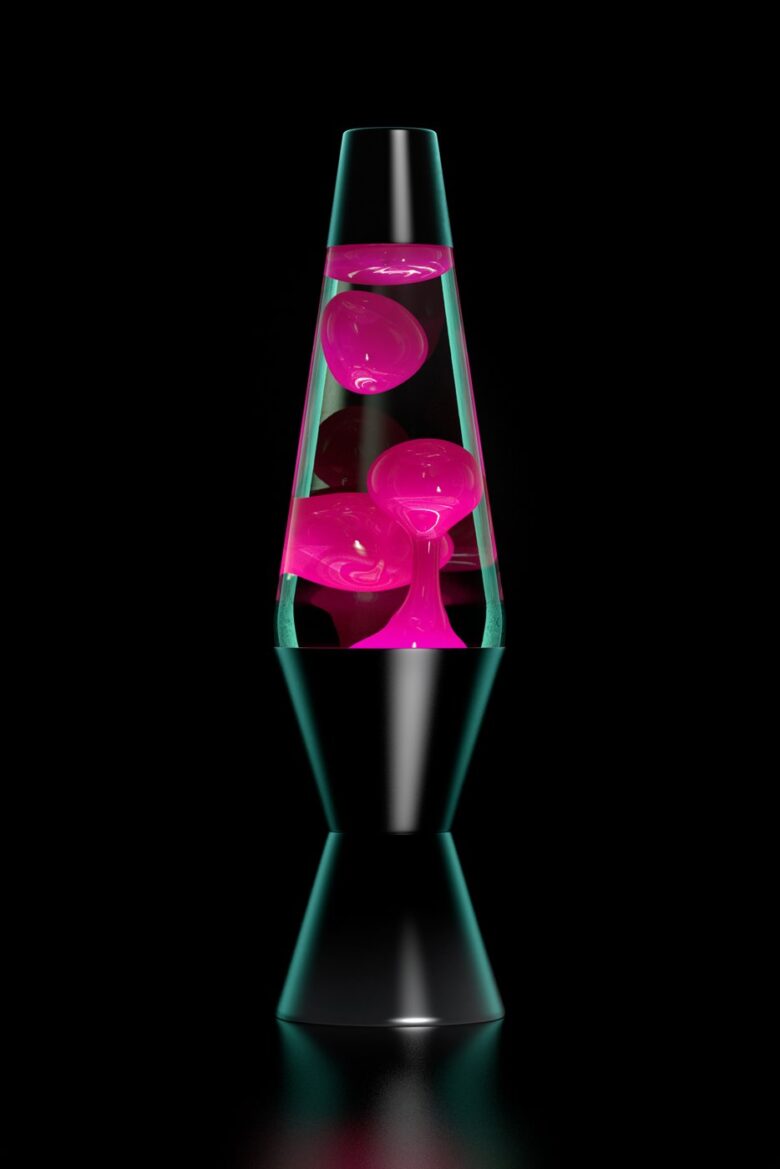 Lava lamp with pink wax on a dark background