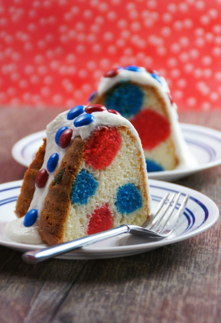 Red white and blue polka dot cake side view of slices