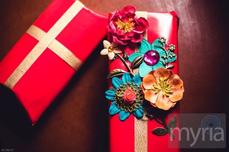Red wrapping paper with gorgeous flower embellishments
