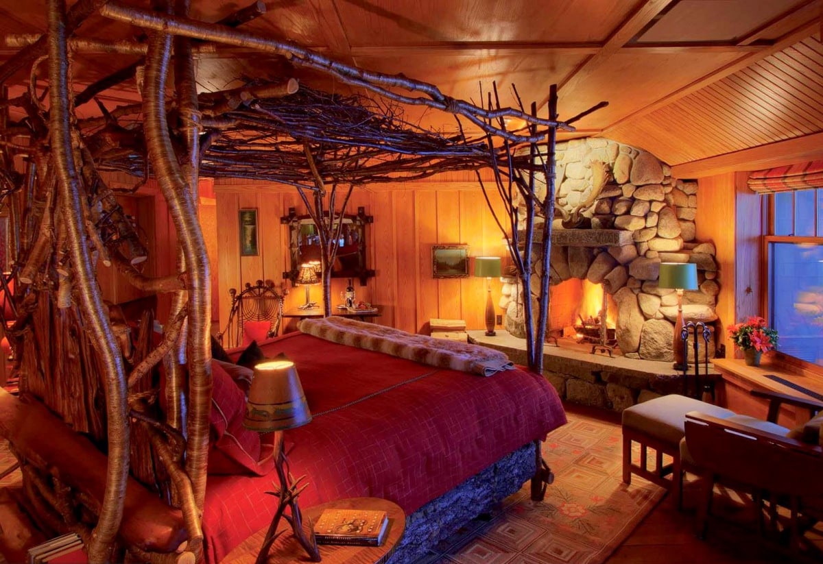 Rustic twig and branch wooden bed at Lake Placid Lodge