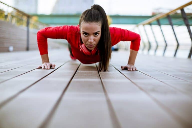 Young woman exercises - 8 ways to master self-discipline