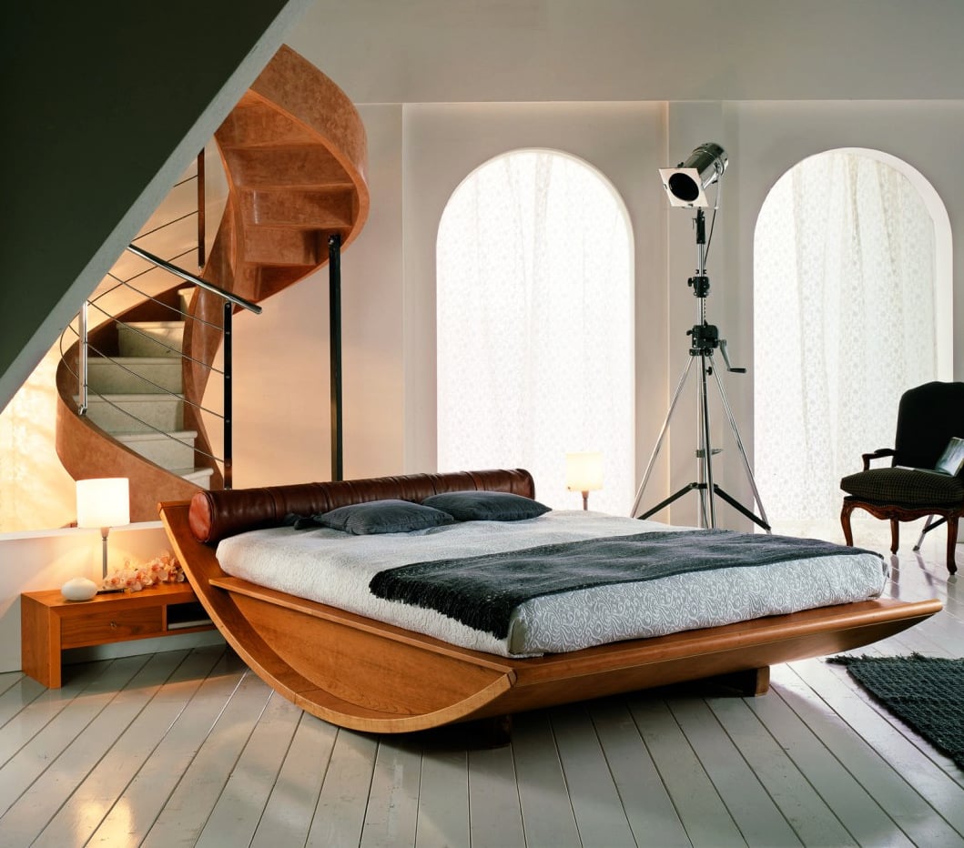 Semi-circular rocking wooden bed