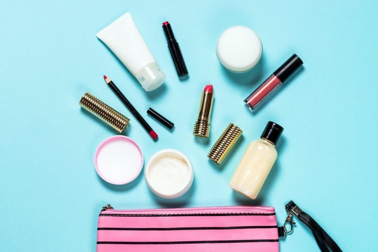Travel makeup bag with cosmetics